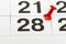 Pin on the date number 28. The twenty eighth day of the month is marked with a red thumbtack. Pin on calendar