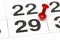 Pin on the date number 29. The twenty ninth day of the month is marked with a red thumbtack. Pin on calendar