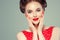 Pin up girl vintage. Wow expressions emotion! Beautiful woman pinup style portrait in retro dress and makeup, manicure nails hands