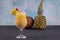 Pina Colada over wooden background garnished pineapple. A cocktail