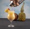 Pina Colada over wooden background garnished pineapple. A cocktail