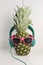 Pinapple with sunglasses and headphones