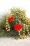 Pine branche adorned beads and hearts