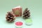 Pine cone , Christmas gift card and candles creating a Christmas idea for gifts