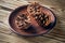 Pine cones on a dark clay plate