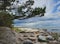 Pine forests in the sand dunes on the Kaltene Beach shore is covered with glacial stones that stretches up to Roja Town in Latvia.