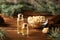 Pine nuts and bottles of Cedar pine nuts essential oil