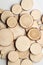 Pine tree cross-sections with annual rings on white background. Lumber piece close-up, top view.