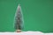 Pine tree on a matte green background