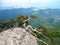 Pine tree on rock with beautiful mountains background, travelling hiking in Crimea