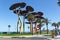 The pine tree sculpture on the seafront promenade in La Pineda, Spain.