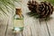 Pine turpentine essential oil in glass bottle