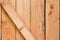 Pine wood vertical plank with diagonal jumper texture and background for text, carpenter construction