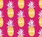 Pineapple background with hand drawn yellow fruits at pink background. Seamless vector pattern
