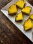 Pineapple chunks on white platter