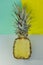 Pineapple on colourful background. About health. Interesting idea. Kitchen ingredients.