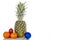 Pineapple, orange, Christmas balls, on a white background