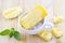 Pineapple popsicles homemade in ice cup and mint on wooden background