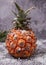 Pineapple on a stone background