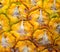 Pineapple surface close up. Macro photo of orange exotic fruit with textured skin