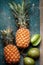 Pineapples and green tropical fruits