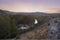 Pineios river crosses gorge near Larissa, during sunset