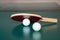 Ping-pong racket and a  two balls on a green table. ping-pong net