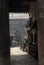 Pingyao in Shanxi Province, China: View through a doorway into an alley and courtyard with bicycles