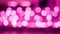 Pink Abstract bokeh background of light from Thai lanna lantern at night. Concepts of celebration in Yi Peng Festival.