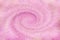Pink abstract swirling background. Pink twirling backdrop