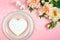 Pink aesthetic elegant fine china events table place setting flat lay.