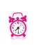 Pink alarm clock on white background