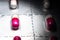 Pink antihistamine capsules in blister pack