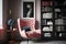 pink armchair surrounded by collection of art books, adding a touch of sophistication