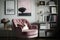 pink armchair surrounded by collection of art books, adding a touch of sophistication