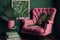 a pink armchair with a throw and a book in the shade of green