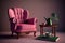 a pink armchair with a tray on the armrest and a cup of tea