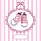 Pink baby shoes and lace frame