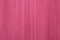 Pink background blur throug intentional camera movement