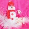 Pink background Christmas red snow white snowman soft toy with white hibiscus flowers and white tinsel