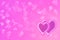 Pink background with flying transparent hearts. Unobtrusive light background abstraction is great for wallpaper or postcards. On
