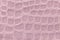 Pink background from soft upholstery textile material, closeup. Fabric with pattern