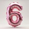 A pink balloon shaped like the number six