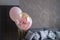 Pink balloons in the interior of a dark gray room of a teenage girl