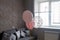 Pink balloons in the interior of a dark gray room of a teenage girl