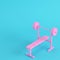 Pink barbell with bench with ball on bright blue background in pastel colors. Minimalism concept