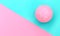 Pink basketball on a bicolor background