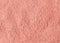 Pink bentonite clay powder texture close up. Diy facial mask and body wrap recipe. Natural beauty treatment and spa. Selective