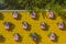 Pink birdhouses on the yellow wall