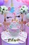Pink birthday cake for girls.Detail of a birthday unicorn cake - focus on rainbow topper